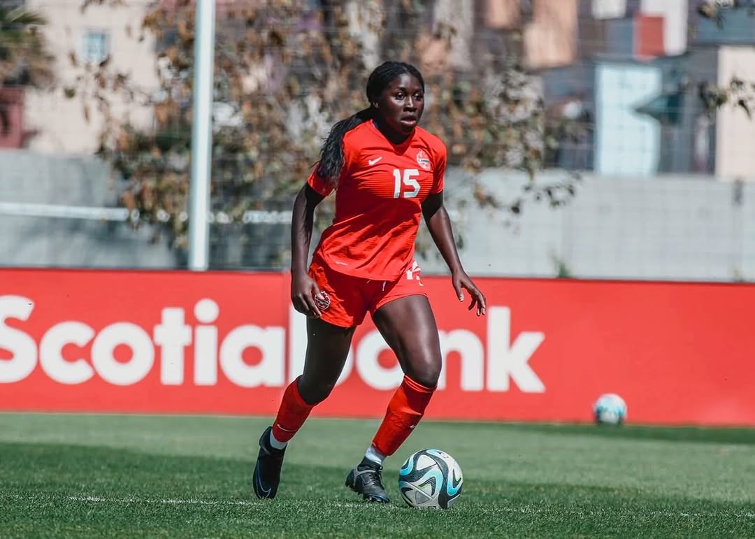 Bridget dribbling in match action