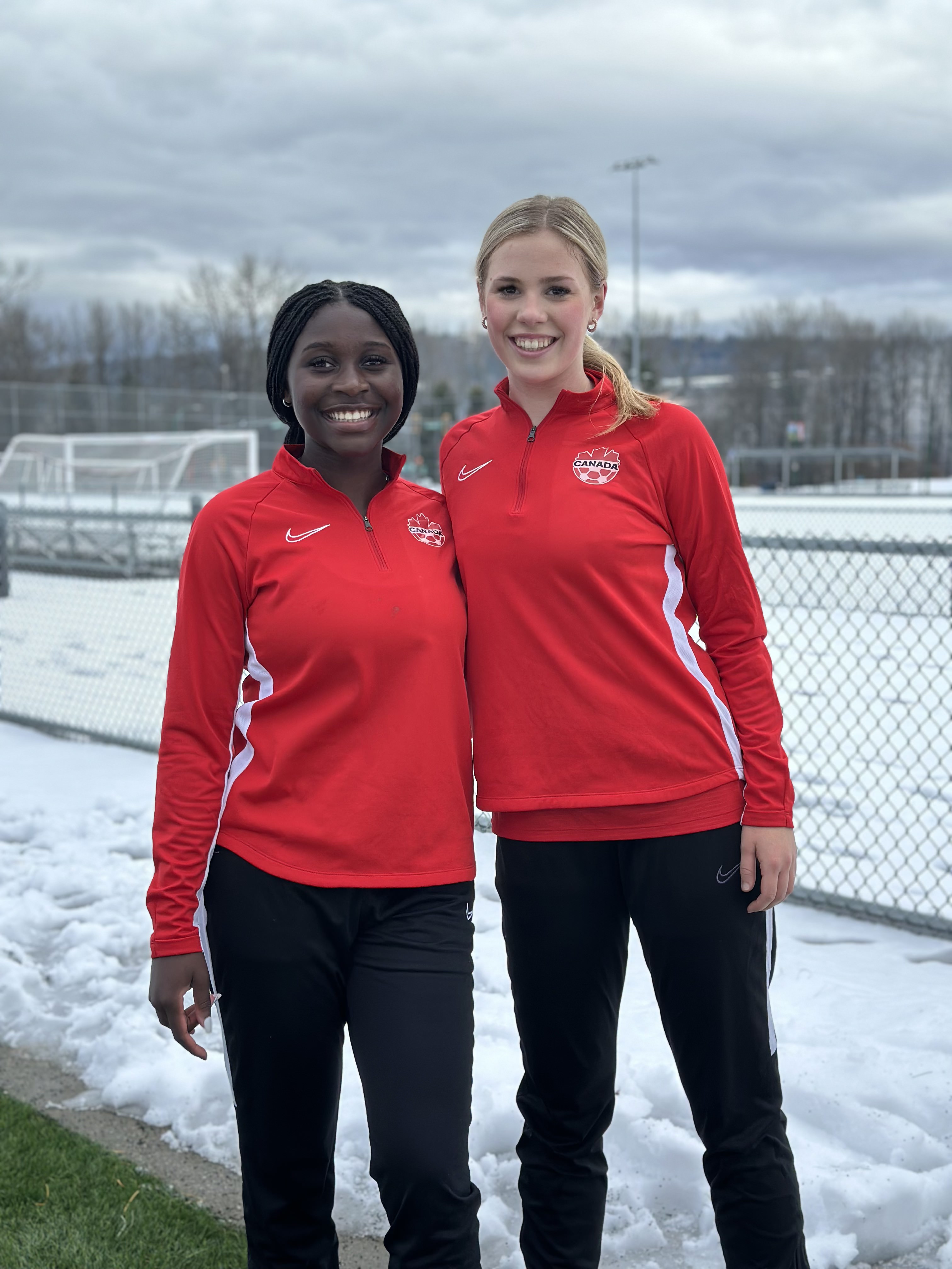 Bridget (left) in Team Canada uniform
